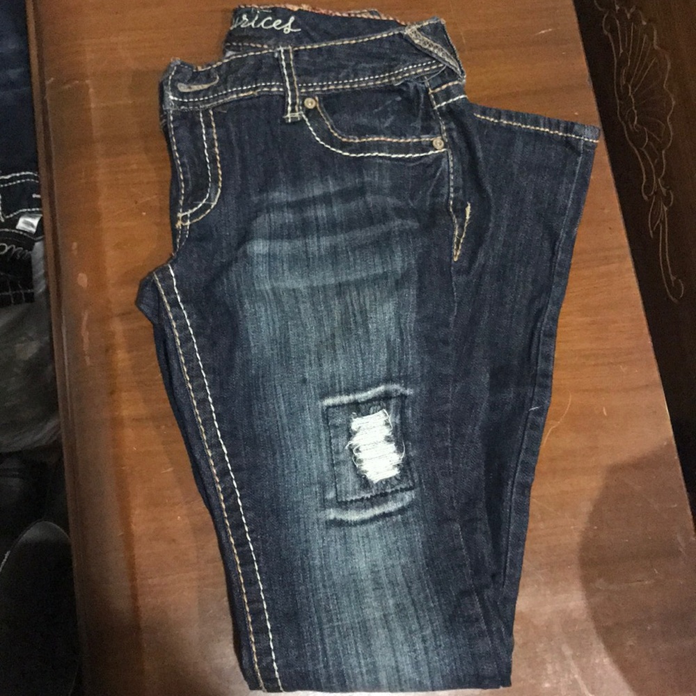 Boot cut distressed jeans